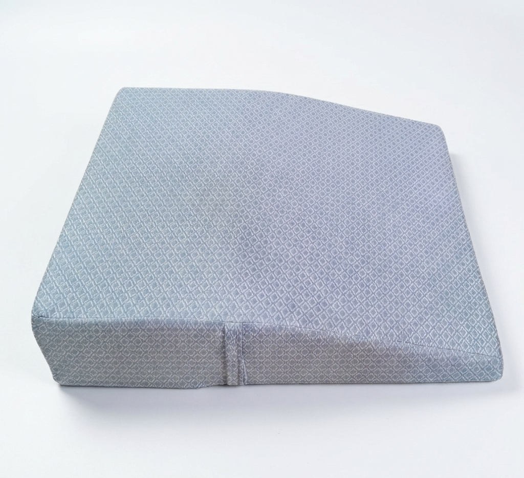 Gray wedge pillow on a white background
