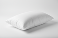 White pillow on a light gray background